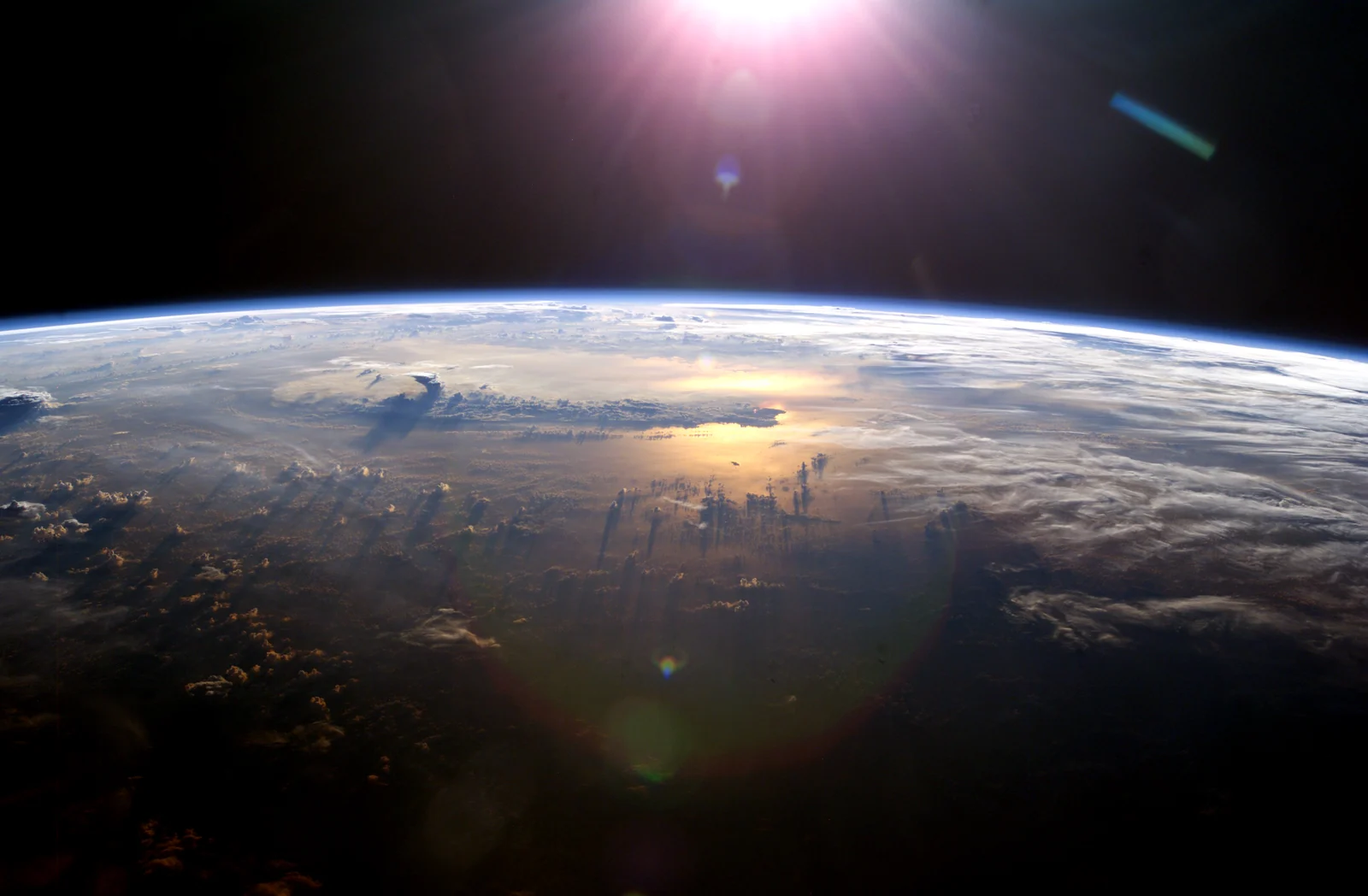 Earth horizon over the Pacific Ocean at sunset